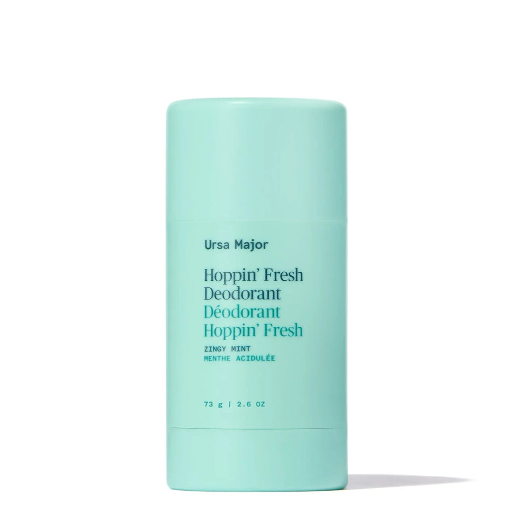 Mint green deodorant stick with text on a white background