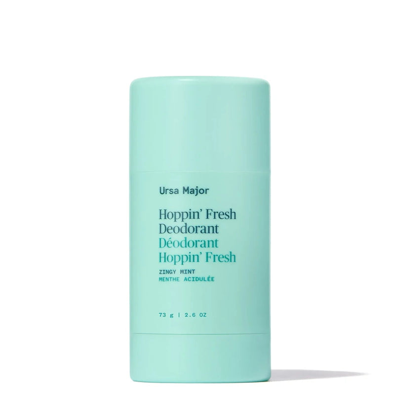 Mint green deodorant stick with text on a white background